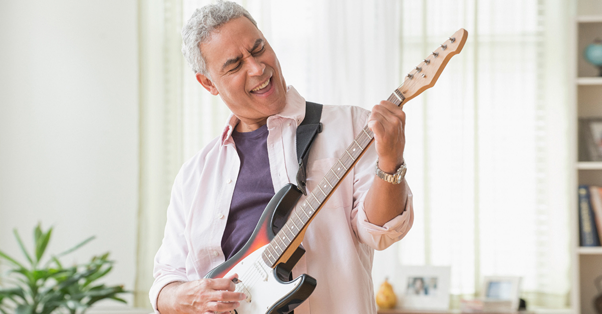 Man playing guitar.